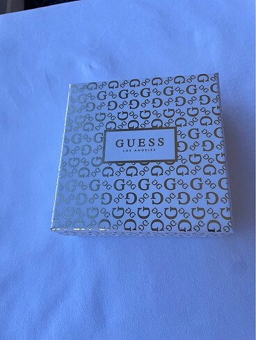 Beden Guess orijinal gümüş renk bileklik charmlı