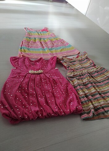 3 tane 1 le 2 yaşa uygun bebek elbisesi