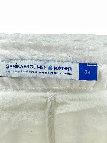 34 Beden beyaz Renk Koton Midi Etek %70 İndirimli.