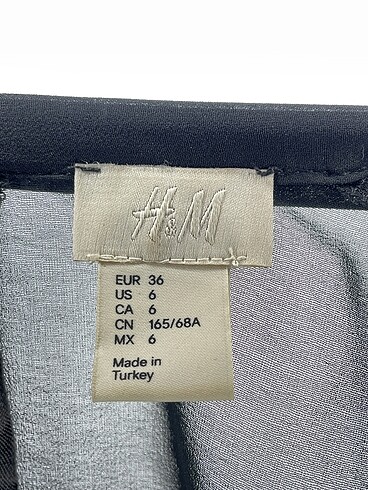 36 Beden siyah Renk H&M Kısa Tulum %70 İndirimli.