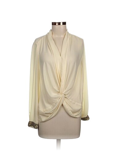 Zara Bluz %70 İndirimli.