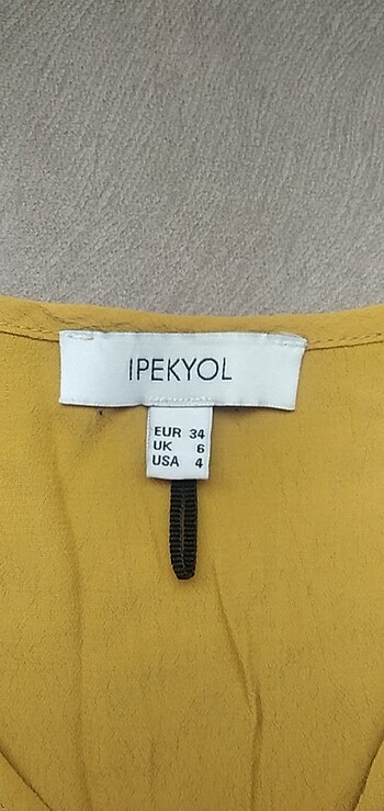s Beden Uzun kollu, sarı renkli, ipekyol marka bluz