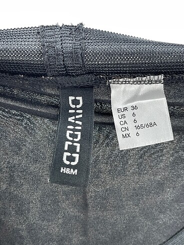 36 Beden çeşitli Renk H&M Midi Etek %70 İndirimli.