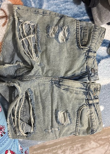 Mavi Yırtık Mini Kot Şort