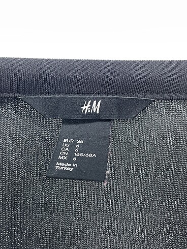 36 Beden siyah Renk H&M Midi Etek %70 İndirimli.