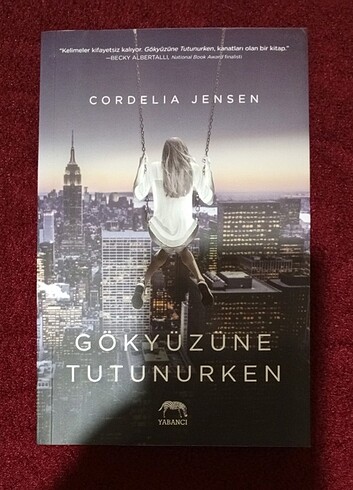 GÖKYÜZÜNE TUTUNURKEN