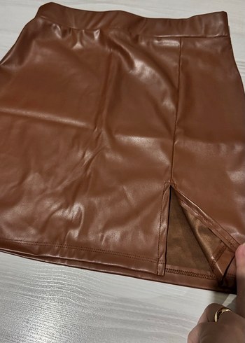 Deri kahverengi yırtmaçlı ve likları etek