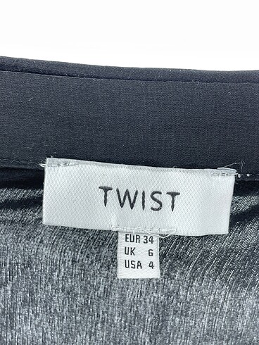 34 Beden siyah Renk Twist Gömlek %70 İndirimli.
