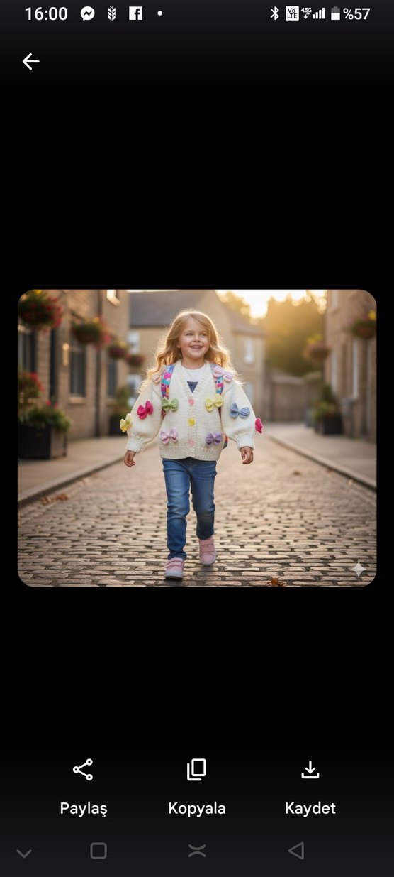 Kız Çocuk Renkli fiyonklarla süslenmiş sıcacık bir hırka - Görsel 2