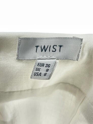 36 Beden beyaz Renk Twist Mini Şort %70 İndirimli.