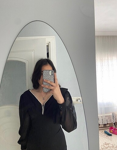 Siyah elbise bilek boyuna gelıyo