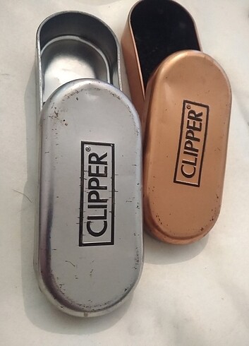 İki adet eski clipper çakmak kutuları teneke 