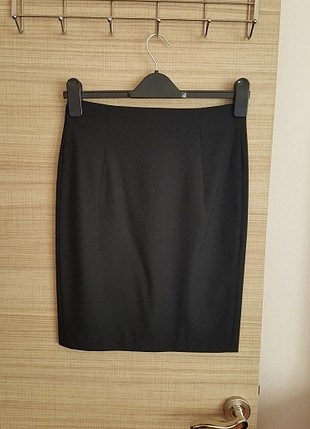 Kısa kumaş etek