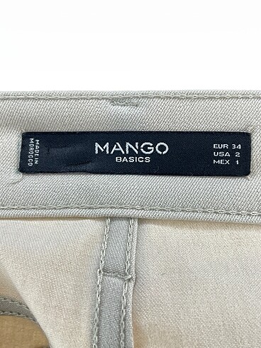 34 Beden ten rengi Renk Mango Kumaş Pantolon %70 İndirimli.