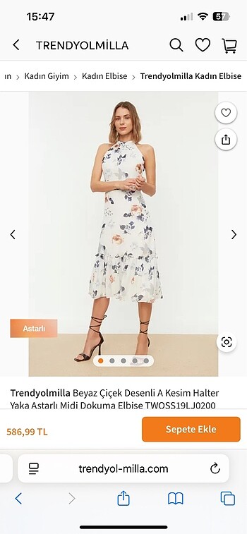 Beyaz çiçekli halter yaka elbise