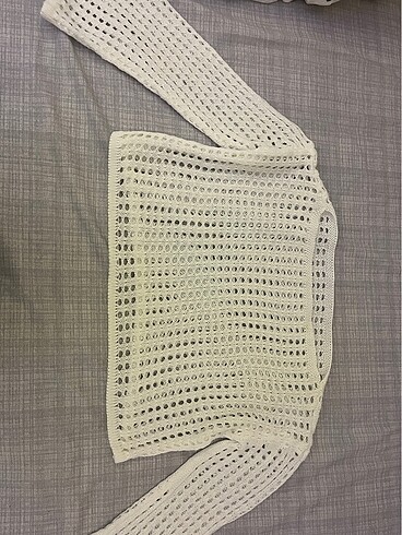 universal Beden geniş yaka delikli crop triko bluz