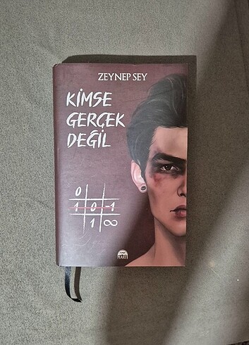 Kimse gerçek değil kitap ciltli