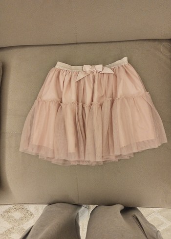 Kız Çocuk Fırfırlı Pastel Bej Etek, kabarık tütülü.