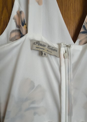 Amerikadan , V Yaka Kolsuz Midi Beyaz Desenli Elbise
. - Görsel 7