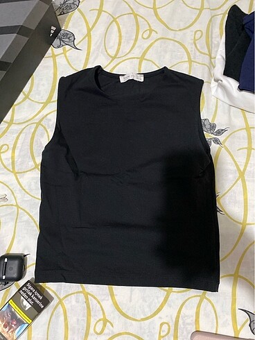 Üste yapışan dar kalıplı body
