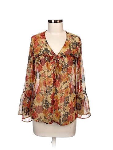 Zara Bluz %70 İndirimli.