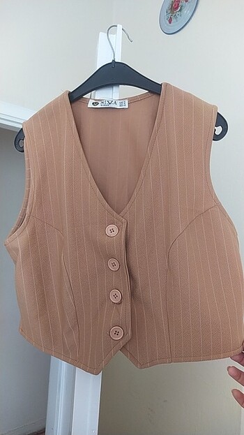Trendyol & Milla Açık kahve yeleğimizin fiyatı sadece 120 TL 