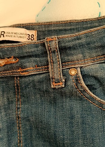 Kadın Mavi Yırtık Dar Paça Kot Pantolon - Görsel 5