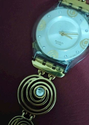 Swatch Zincir Detaylı Parlak Altın Bohem Kadın Saati