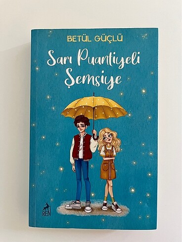 Sarı puantiyeli şemsiye