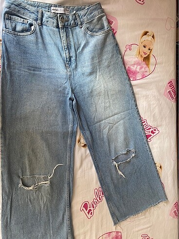 Koton yırtık paçası püsküllü kot pantolon