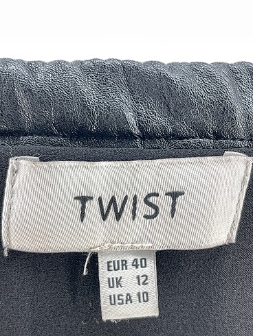 40 Beden siyah Renk Twist Midi Etek %70 İndirimli.