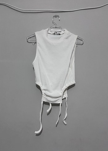 Beyaz Yüksek Yakalı Kolsuz Bodysuit