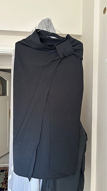 Bel detay yırtmaçlı midi etek