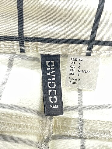 36 Beden beyaz Renk H&M Kumaş Pantolon %70 İndirimli.