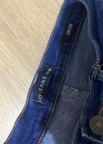 28 Beden Parlak Mavi Kemerli Kadın Kot Pantolon