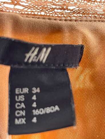 34 Beden çeşitli Renk H&M Bluz %70 İndirimli.