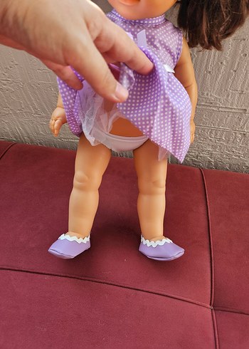 Beden Renk Lila Puantiyeli Elbise Giymiş Bebek