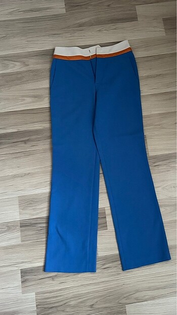 Beli şeritli pantalon