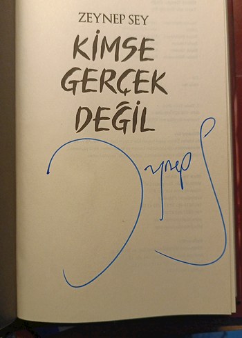 İmzalı, posterli, "Kimse Gerçek Değil" kitabı - Görsel 3