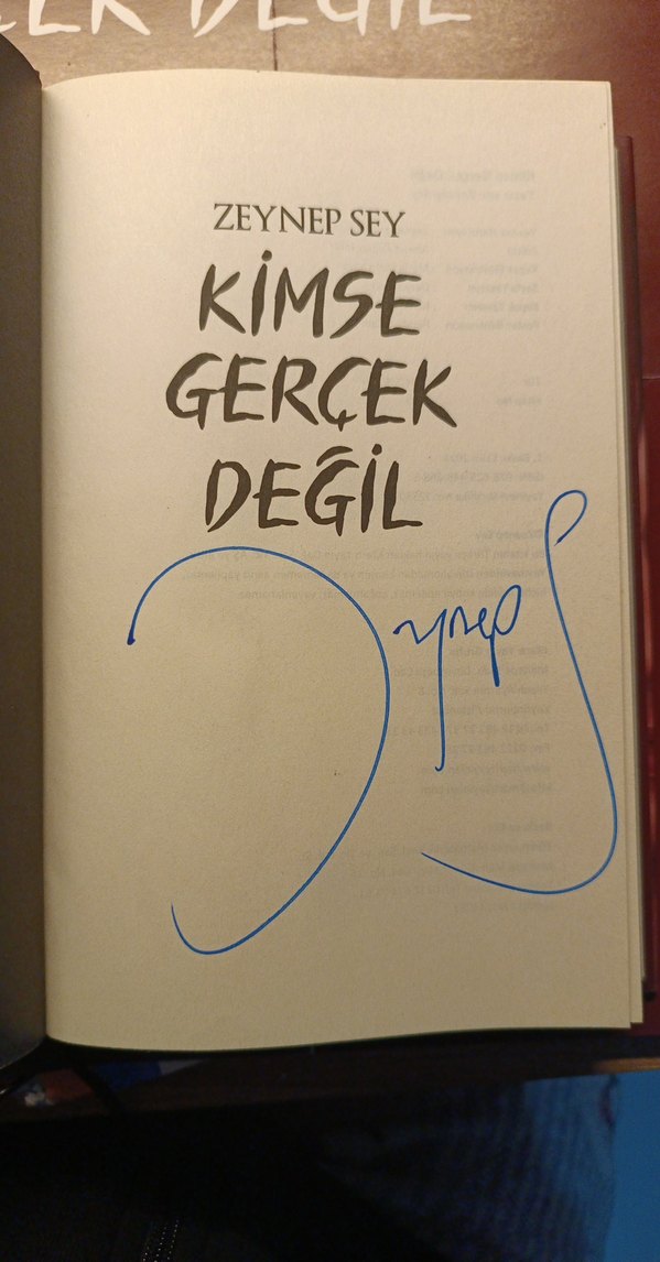 İmzalı, posterli, "Kimse Gerçek Değil" kitabı - Görsel 3