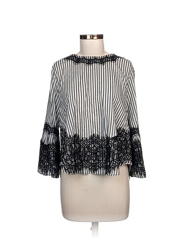 Zara Bluz %70 İndirimli.