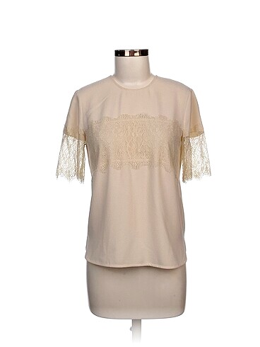 Zara Bluz %70 İndirimli.