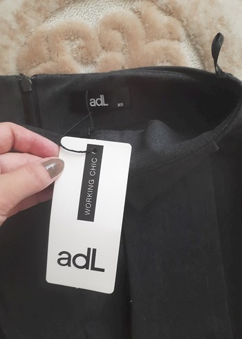 ADİL IŞIK ANVELOP KESİM PİLELİ ETEK - Görsel 3