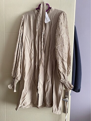 Tunik. K