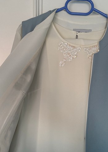 Diğer krem rengi pantolon ve tunik +yelek takım