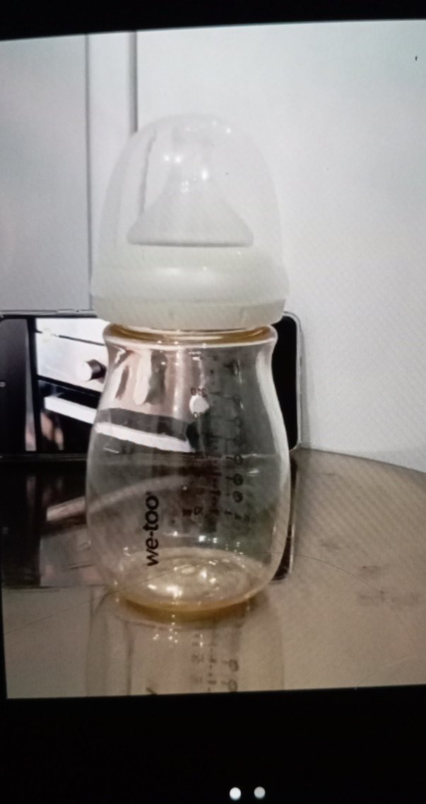 Beyaz ve Gri Bebek Biberonu - Görsel 2