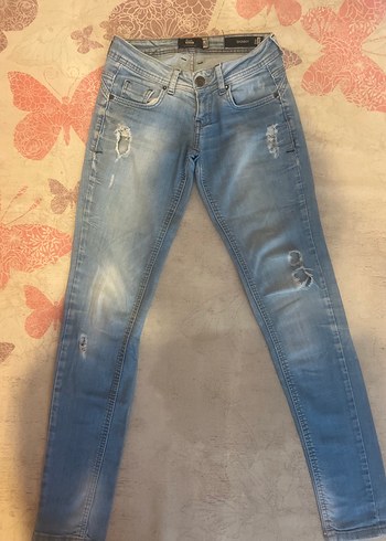 Kadın Mavi bershika dar yırtıklı Kesim Düşük Bel Denim Pantolon