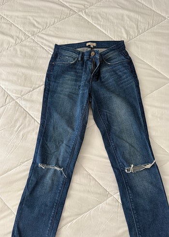 Kadın Mavi Denim Yırtık Detaylı Dar Kesim Jean