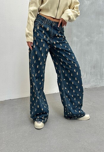 Yırtıklı eskitme bol paça jeans