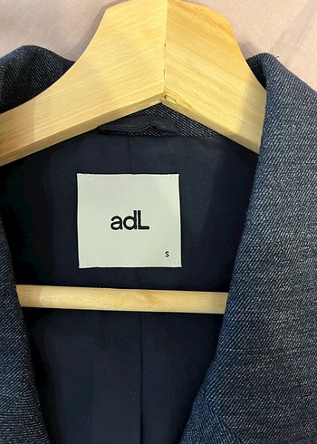 Adil Işık Adl yelek